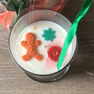 Festive Candle with Gingerbread and Snowflake Accents